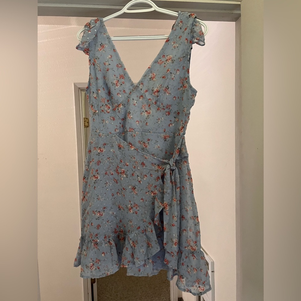Size medium mini dress. Brand Dee Elly. Never worn. Brand new with tags.